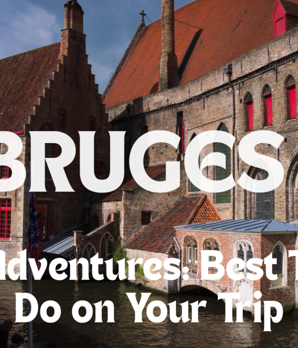 Colorful houses by Bruges canal.