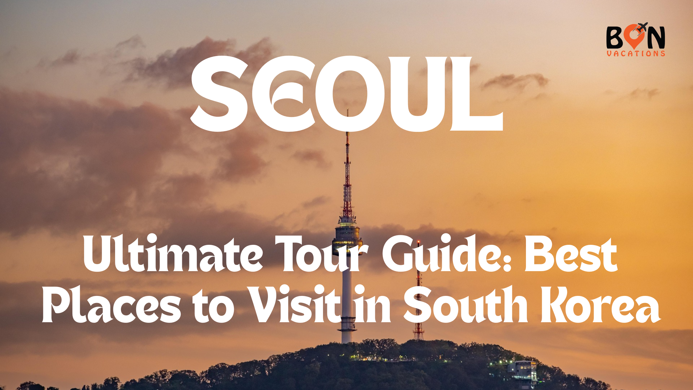 Skyline view of Seoul with Namsan Tower at sunset.